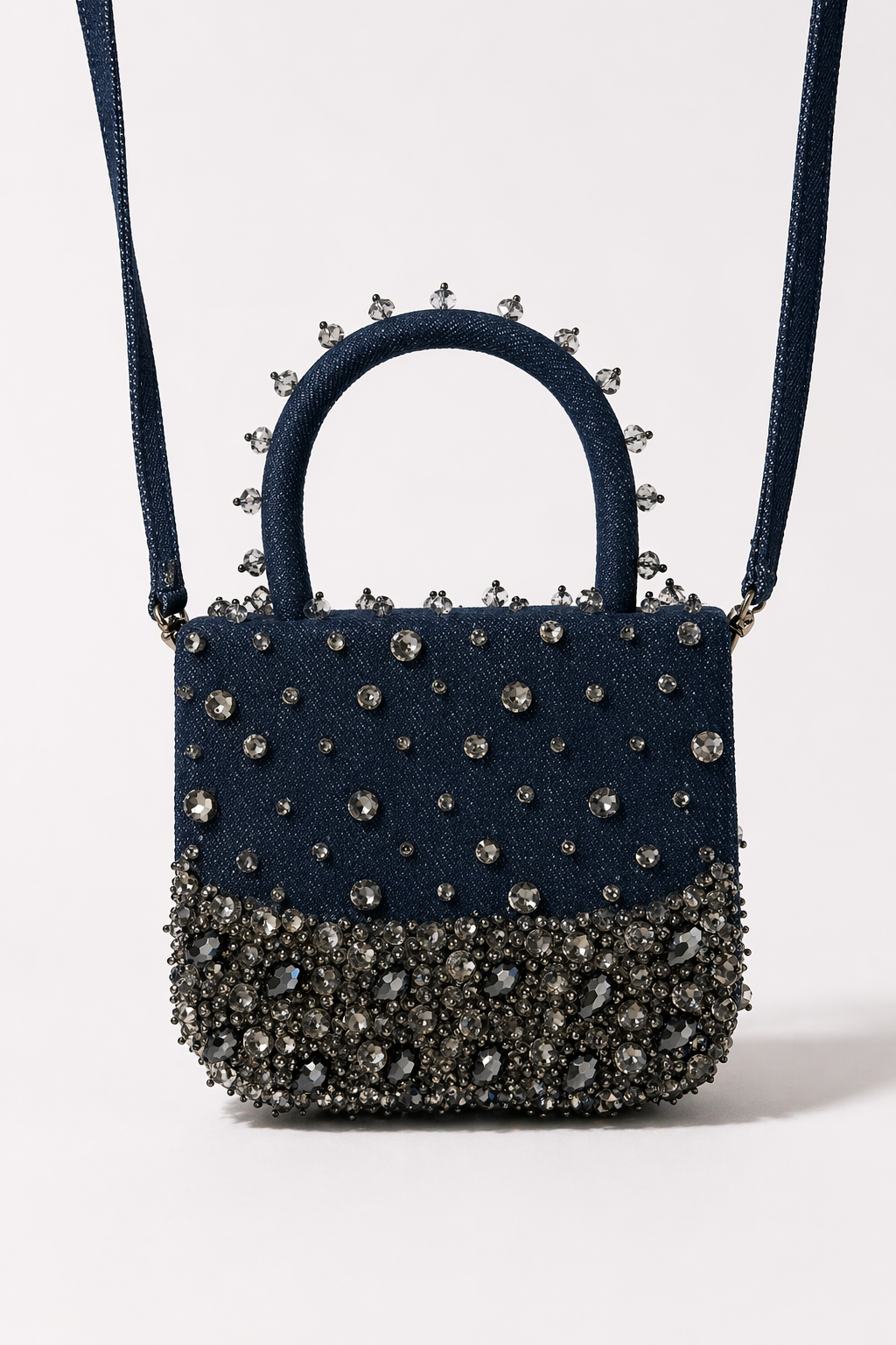 Handcrafted blue party handbag combining modern denim texture