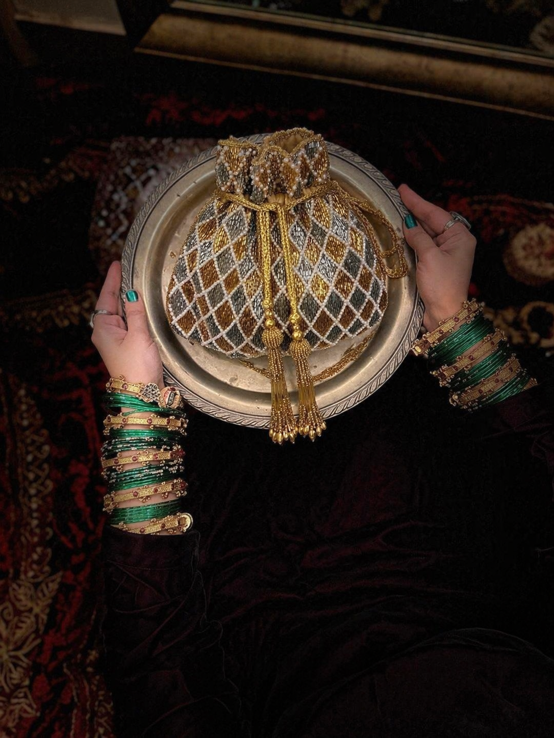 Handcrafted bridal potli purse combining timeless craftsmanship with luxe party glamour