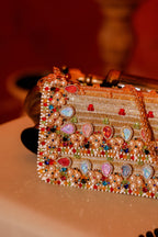 Handcrafted celebration handbag styled perfectly with festive and occasion wear outfits