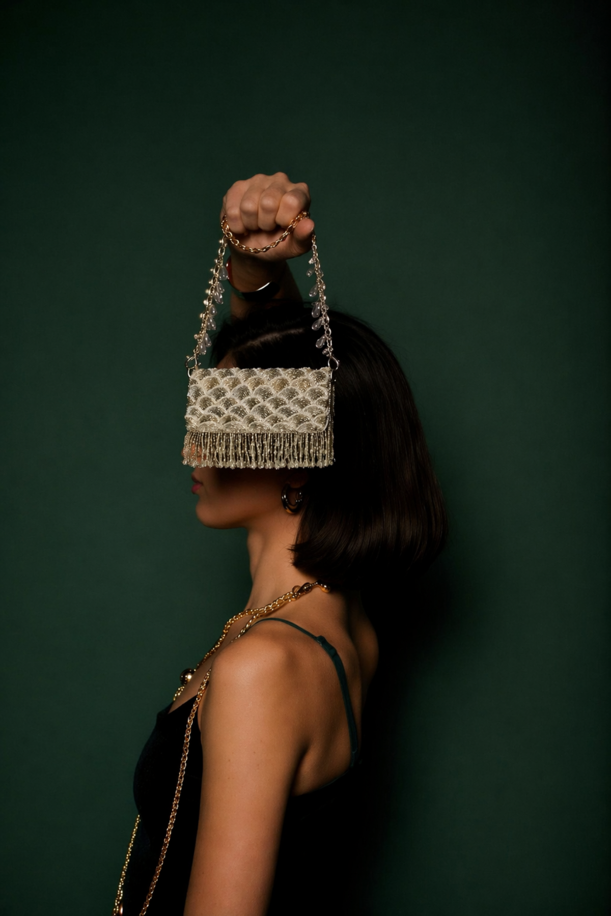 Handcrafted festive fringe bag combining artisanal craftsmanship with modern evening glamour