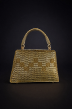 Handcrafted gold evening bag combining artisanal craftsmanship with luxe glamour