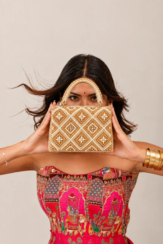 Golden clutch bag