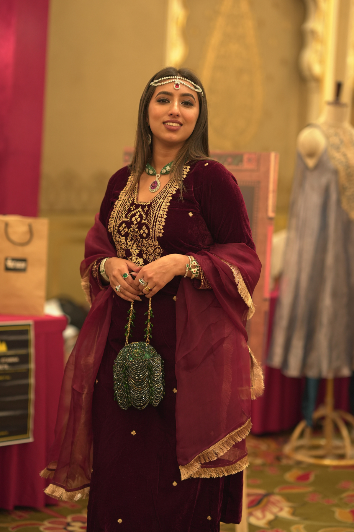Handcrafted dark green celebration purse styled perfectly for festive dressing