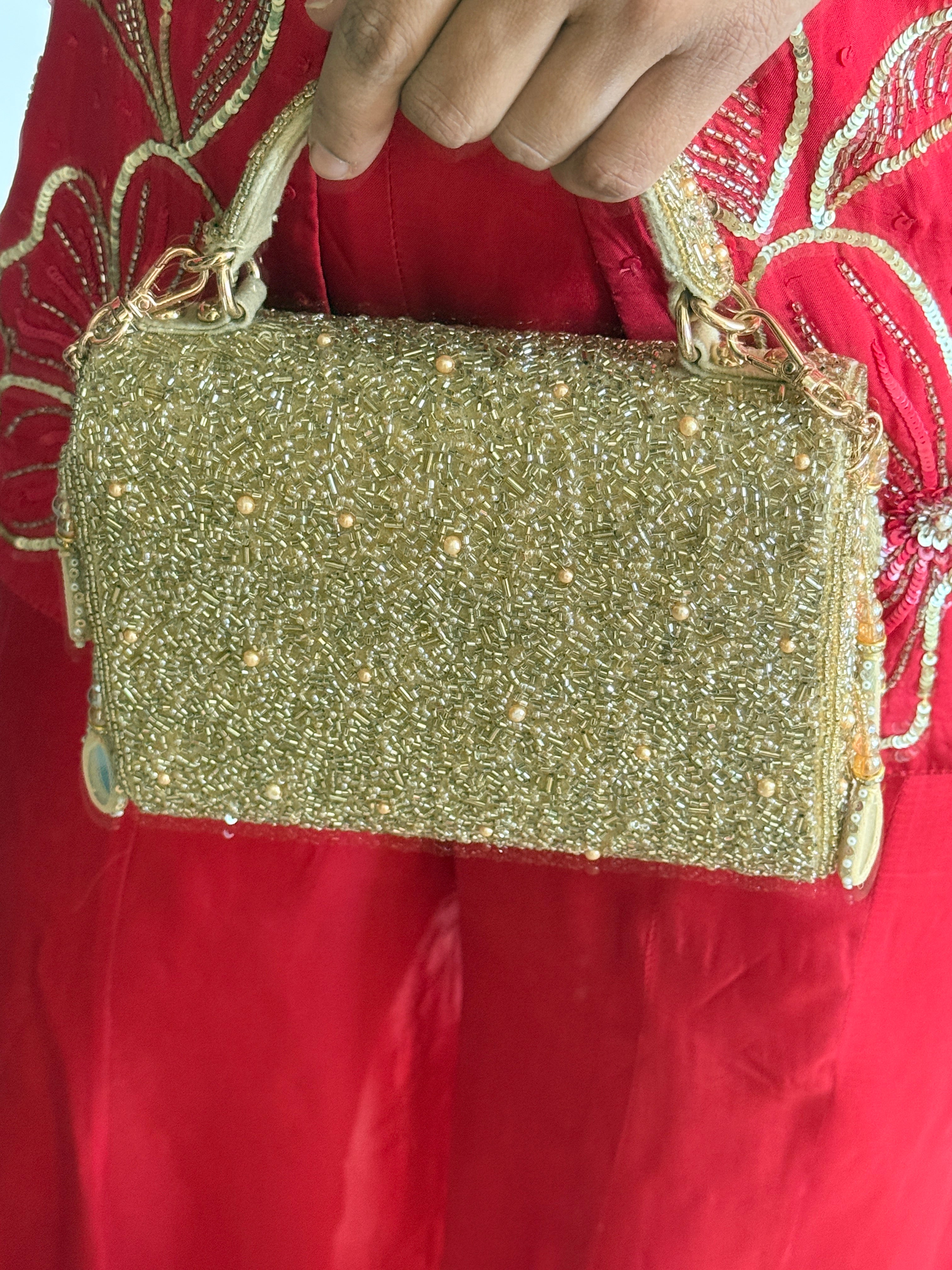 Handcrafted mirror purse combining artisanal craftsmanship with celebration-ready sparkle