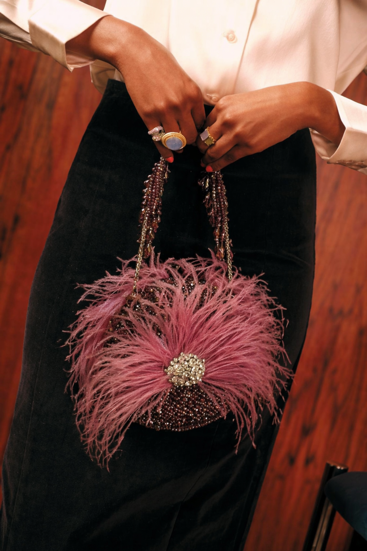 Handcrafted pink festive handbag styled perfectly for celebrations and evening glamour