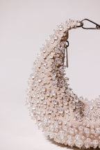 Party handbag with textured beadwork and luxurious handcrafted finish