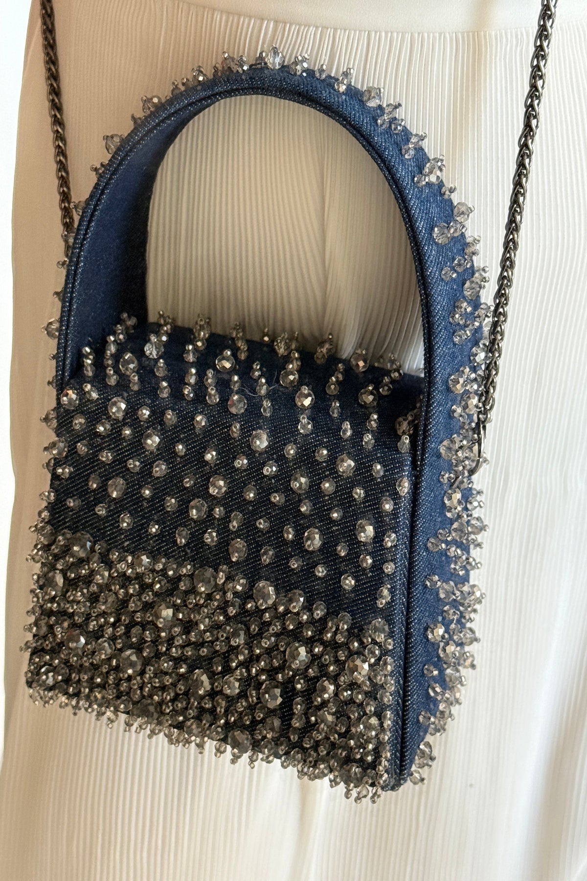 Handcrafted studded purse styled perfectly for dinners, parties, and night-out looks