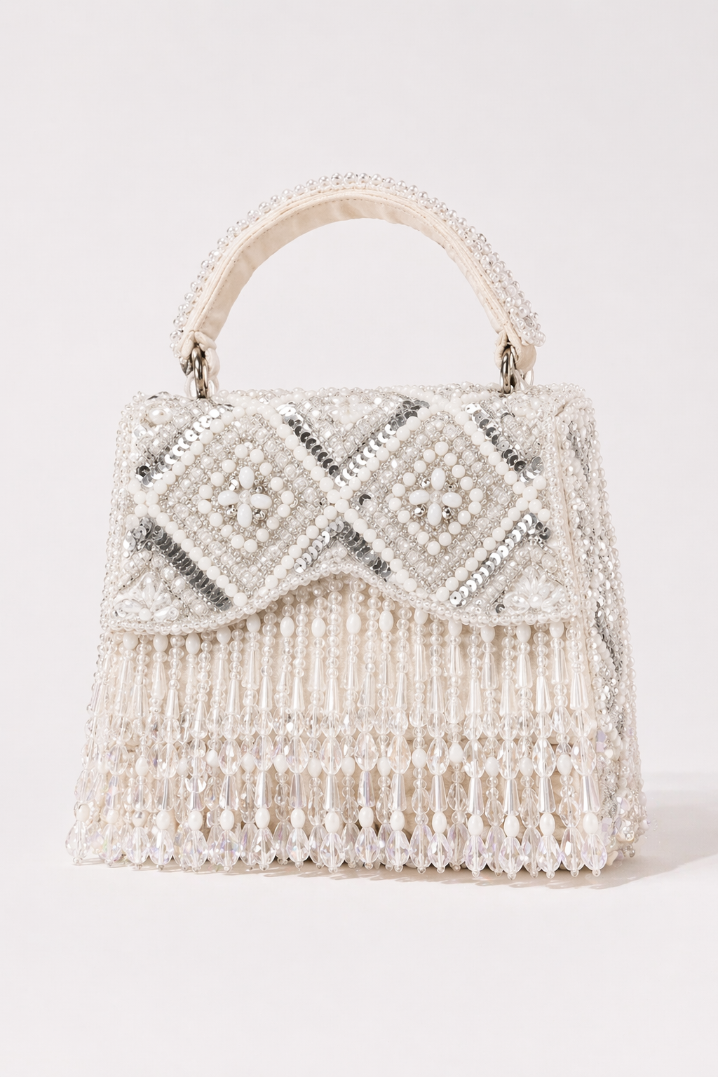 Ivory beaded handbag with pearl detailing and cascading fringe embellishments