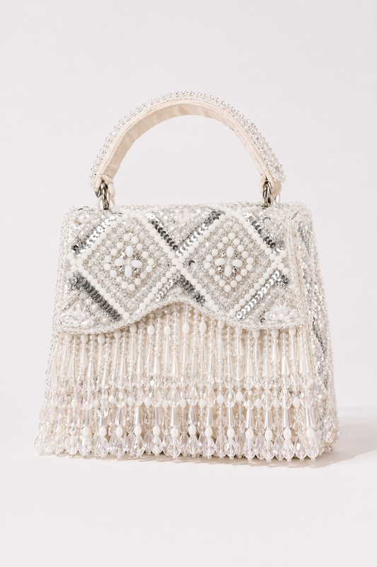 Ivory beaded handbag with pearl detailing and cascading fringe embellishments