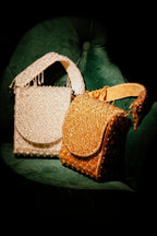 Resort-inspired ivory evening purse designed for vacations, dinners, and glamorous events