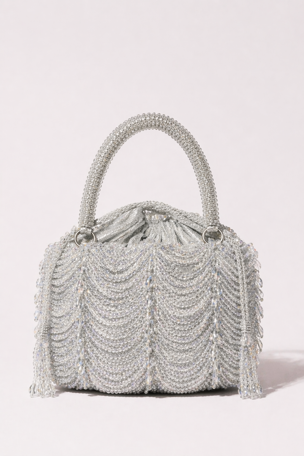 Silver handbag with layered bead detailing and elegant festive craftsmanship