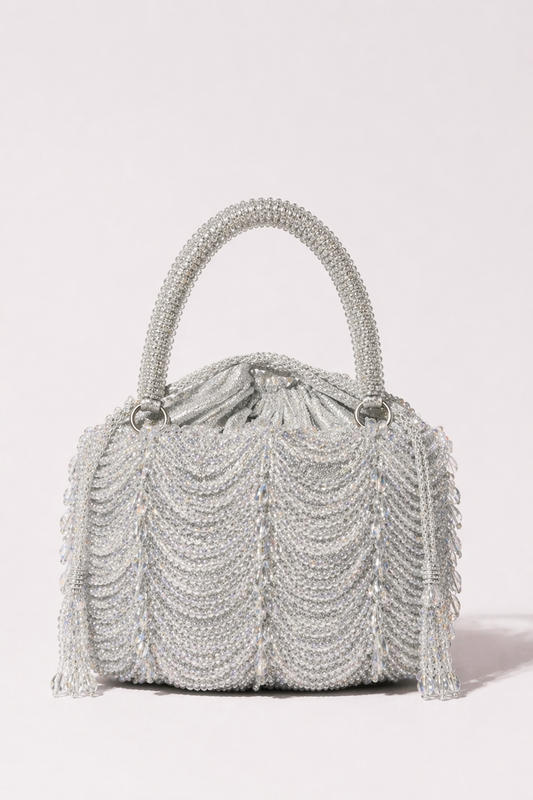 Silver handbag with layered bead detailing and elegant festive craftsmanship