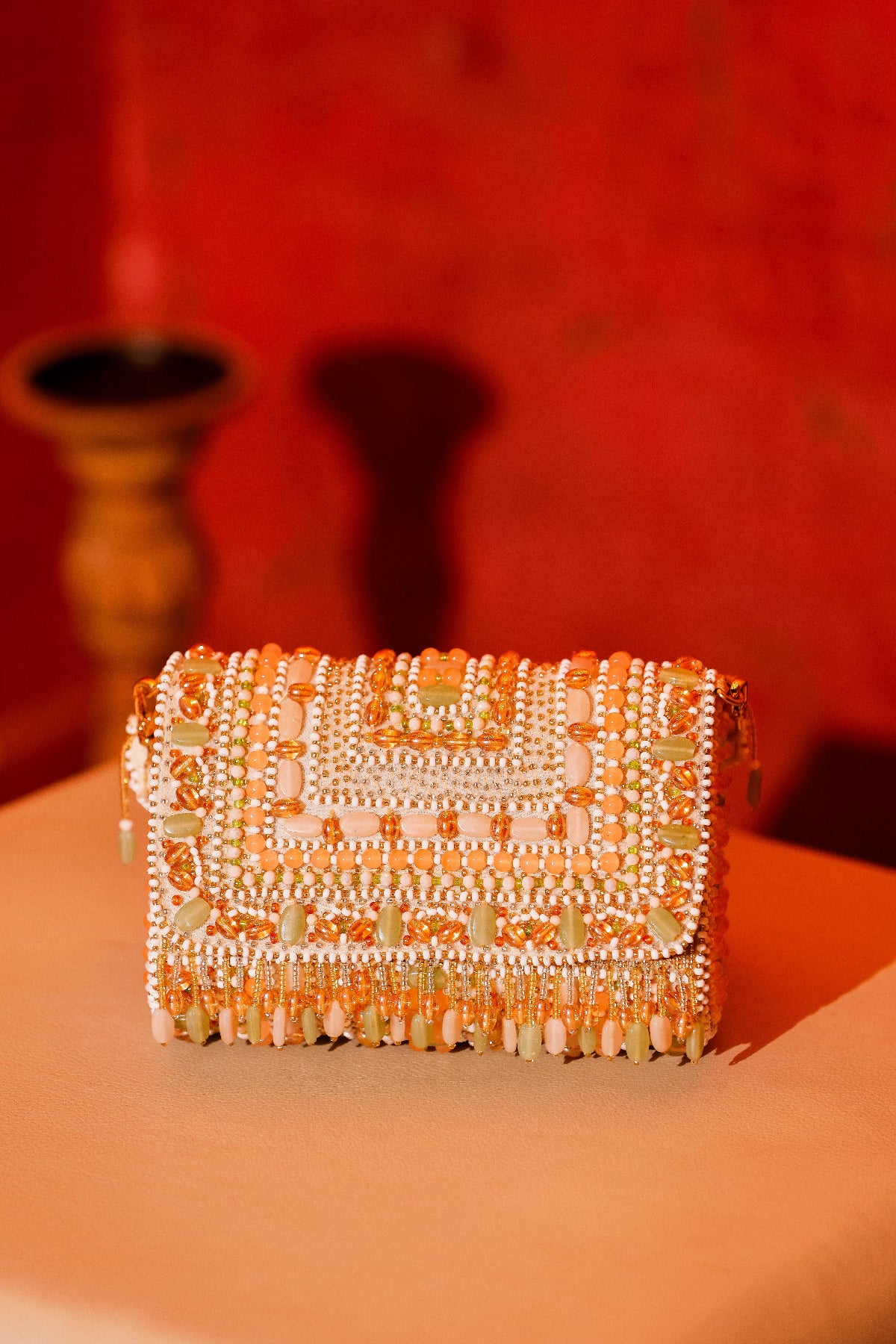 Luxury ethnic purse combining artisanal craftsmanship with elegant festive glamour
