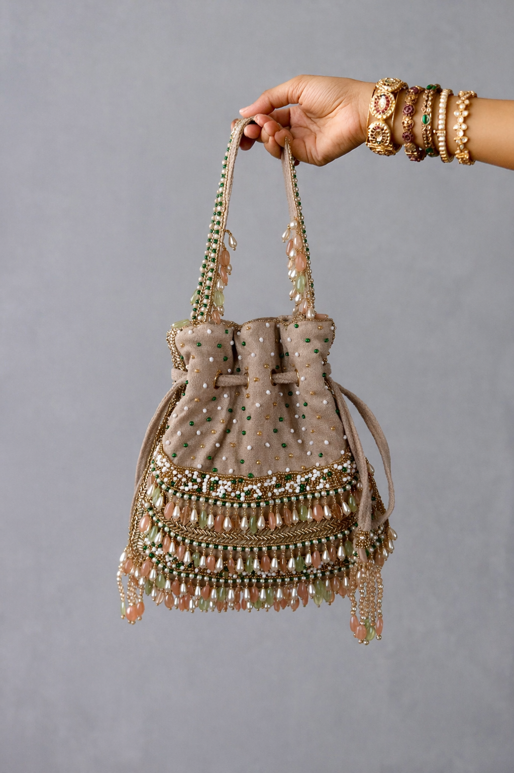 Luxury festive drawstring purse inspired by glamorous celebrations and traditional styling
