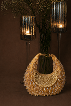Luxury gold evening purse featuring intricate beadwork and statement crystal accents