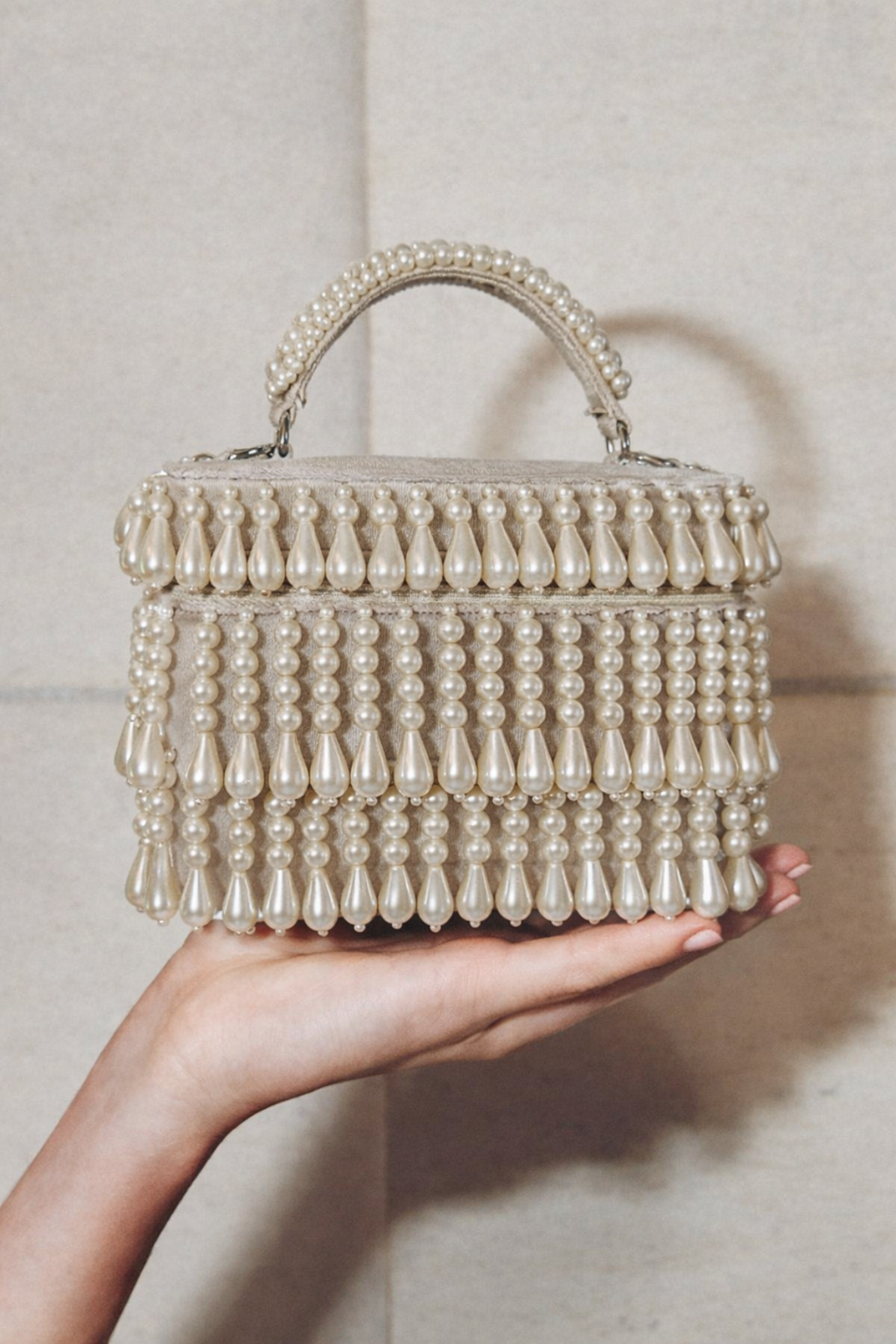 Luxury pearl gift handbag inspired by festive celebrations and elegant evening styling