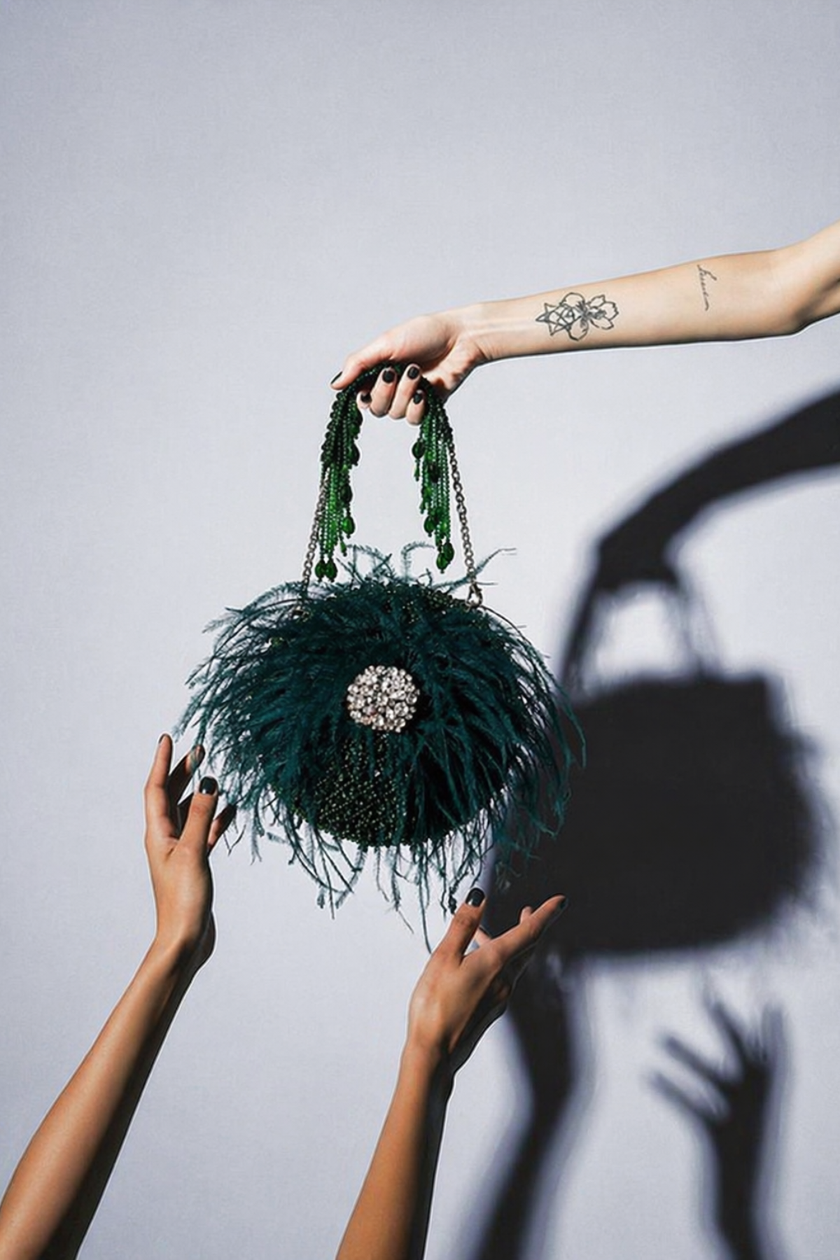 Mehendi round designer handbag inspired by festive celebrations and glamorous styling