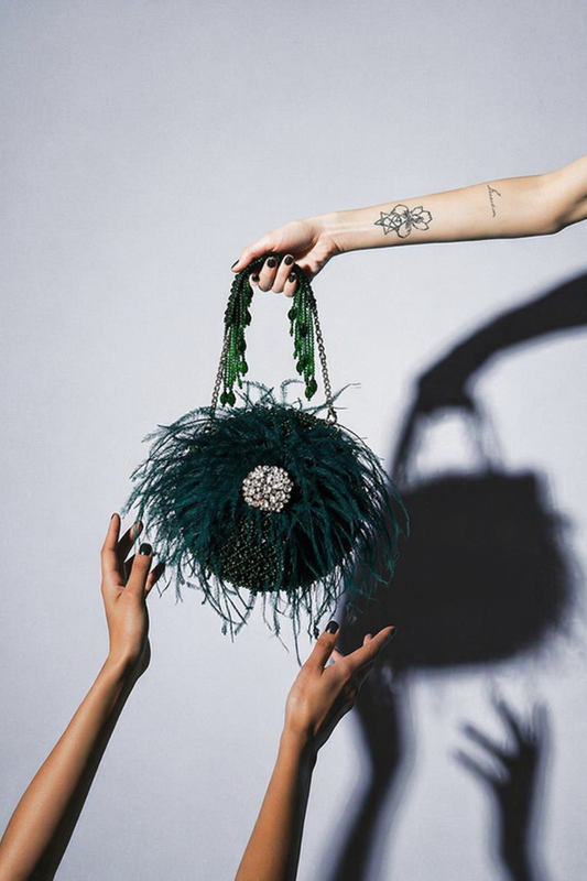 Mehendi round designer handbag inspired by festive celebrations and glamorous styling