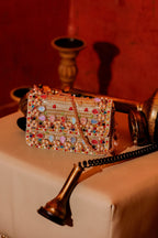Multicolor crystal occasion bag combining artisanal craftsmanship with bold festive sparkle