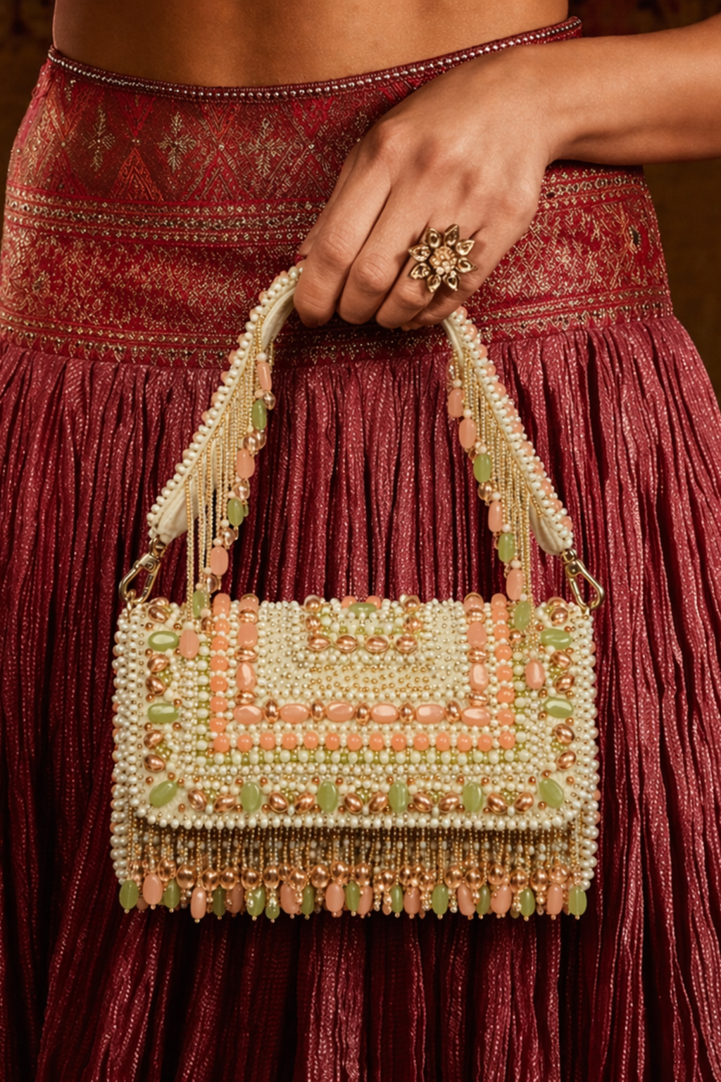 Pastel wedding guest bag featuring handcrafted detailing and statement tassel accents