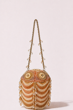 Luxury peach pearl embellished evening bag with crystal detailing and statement handle
