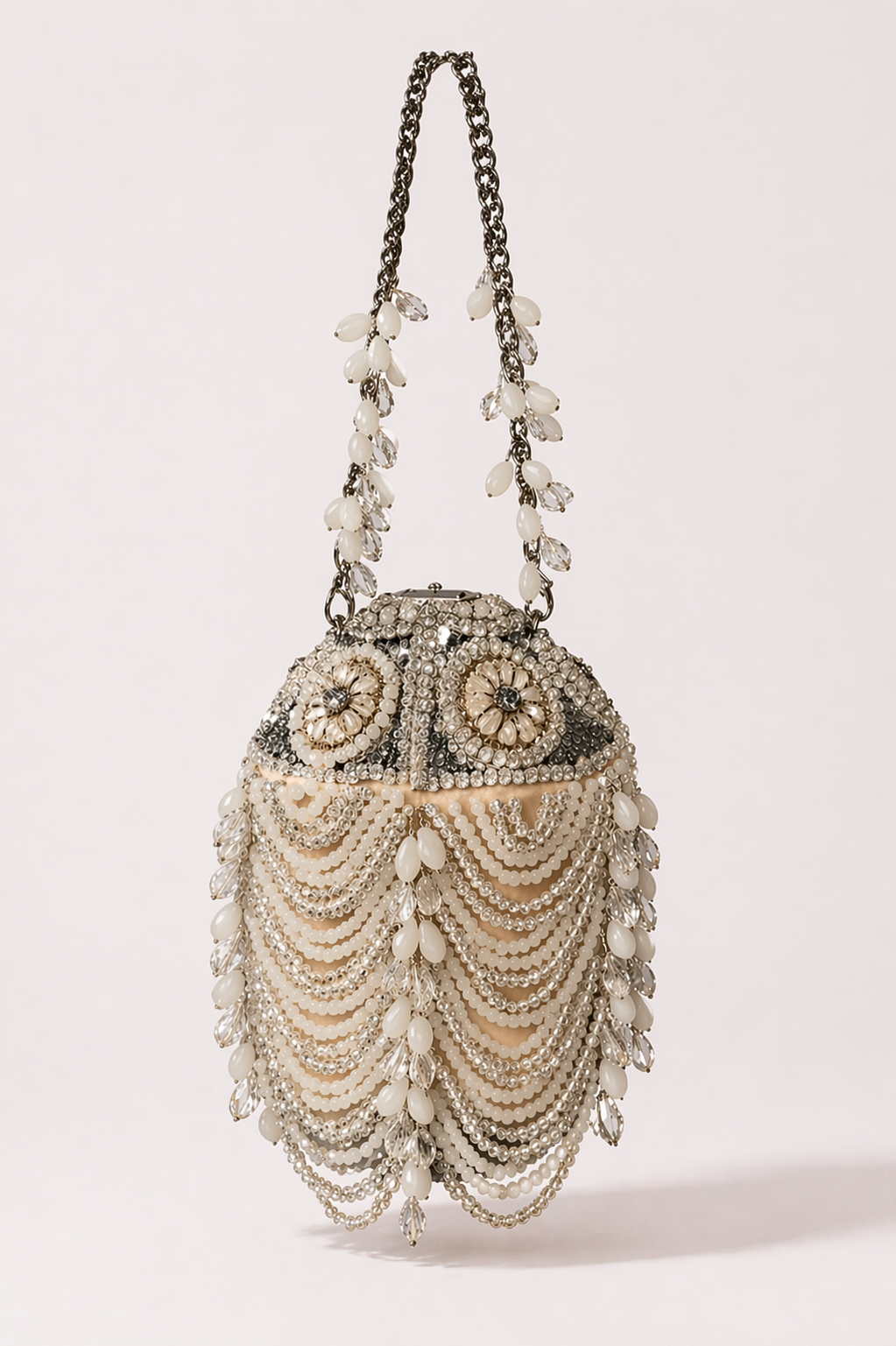 Luxury pearl embellished evening bag with crystal detailing and suede base