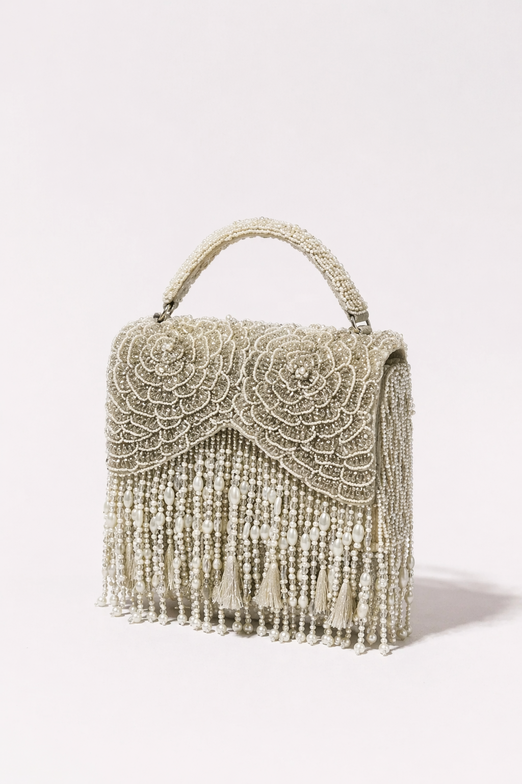 Pearl fringe evening bag with layered bead embroidery and elegant handcrafted detailing