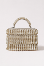 Pearl holiday party bag with layered pearl detailing and elegant handcrafted texture