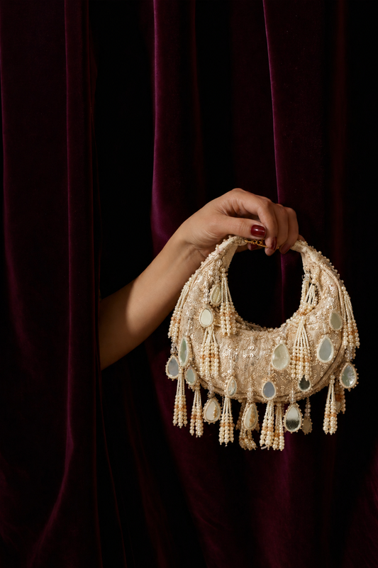 Luxury wedding guest shoulder bag inspired by boho glamour and celebration styling