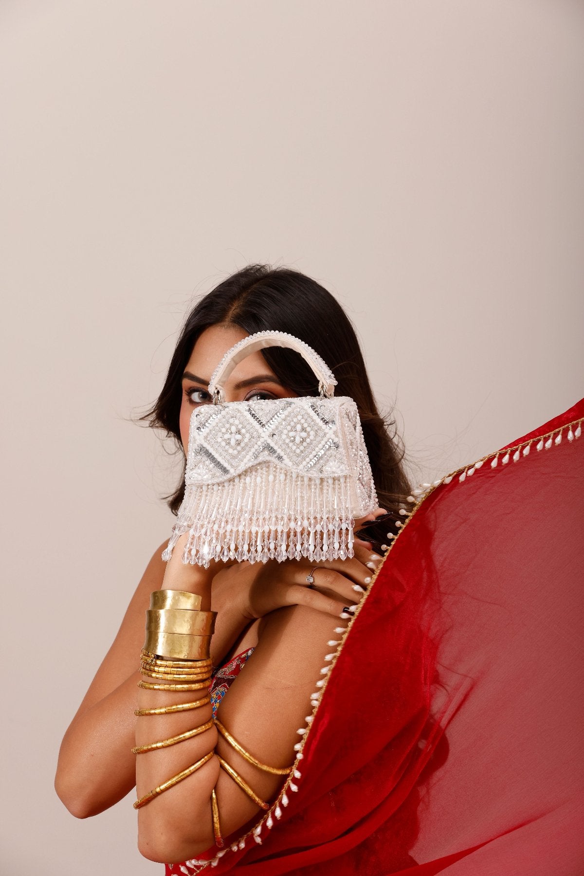 Wedding guest party bag inspired by festive glamour and elegant evening styling