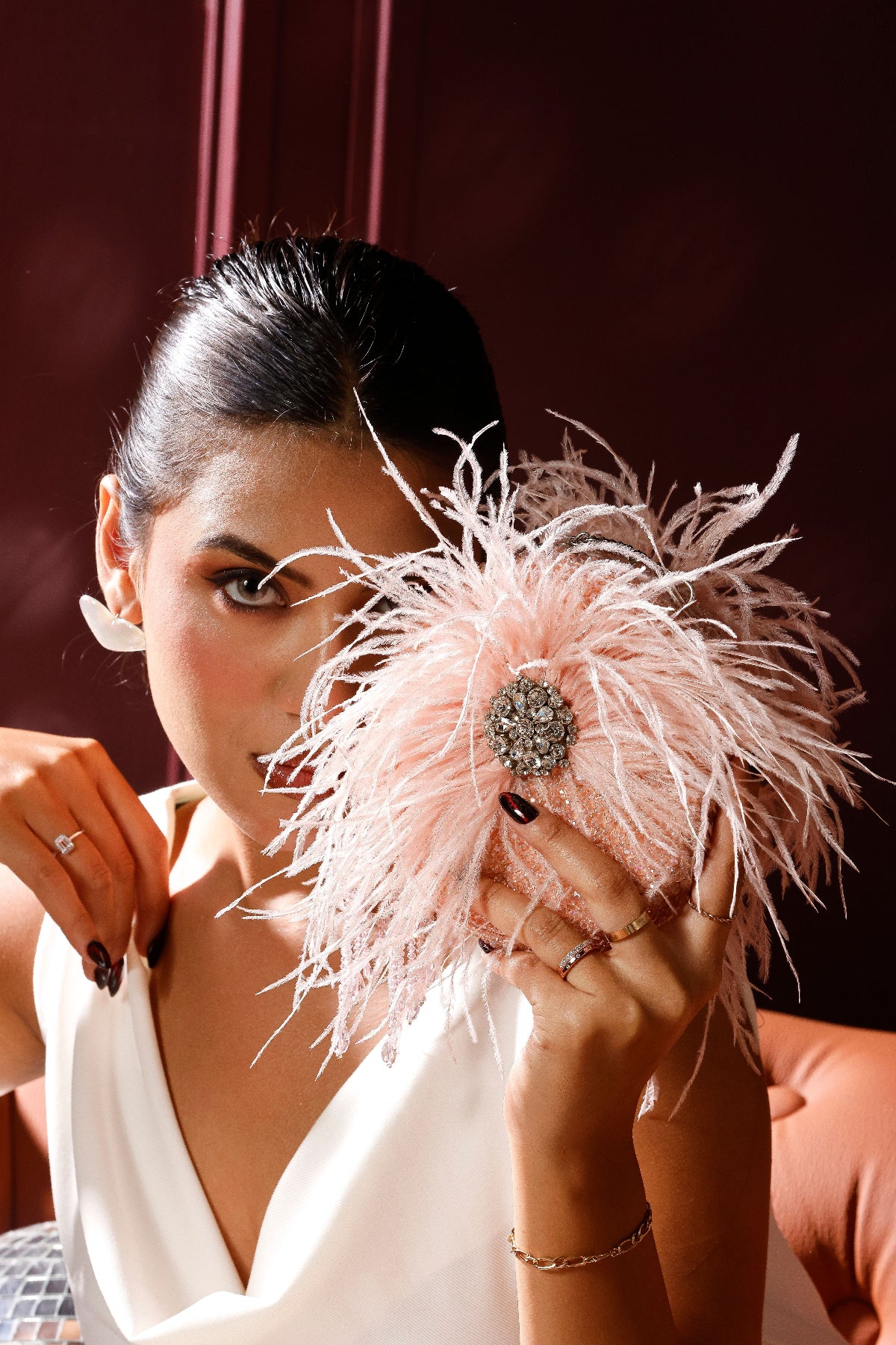 Soft pink occasion bag designed for cocktail parties and celebration dressing