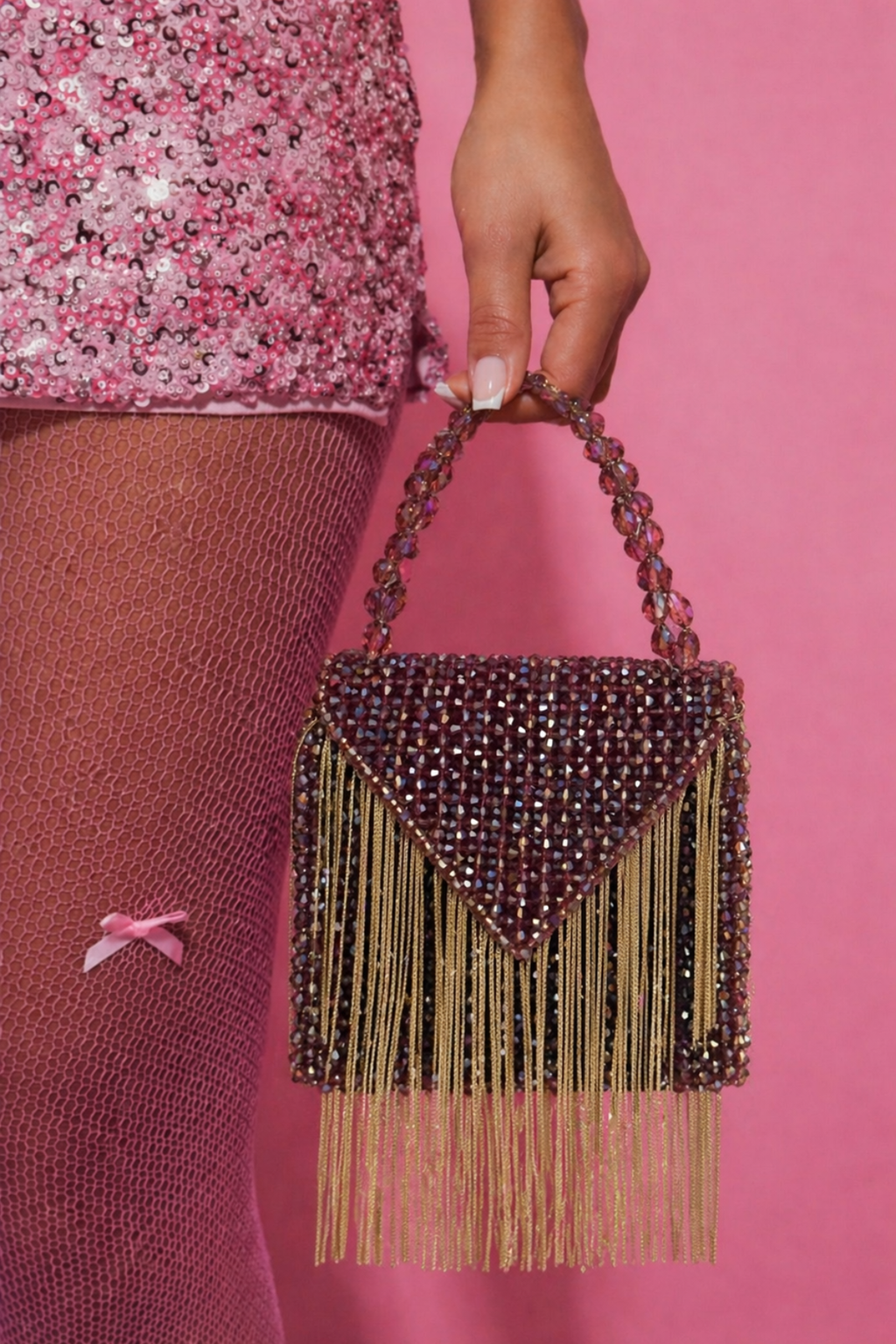 Sparkly shoulder purse inspired by glamorous vacations and luxury night-out looks