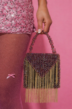 Sparkly shoulder purse inspired by glamorous vacations and luxury night-out looks