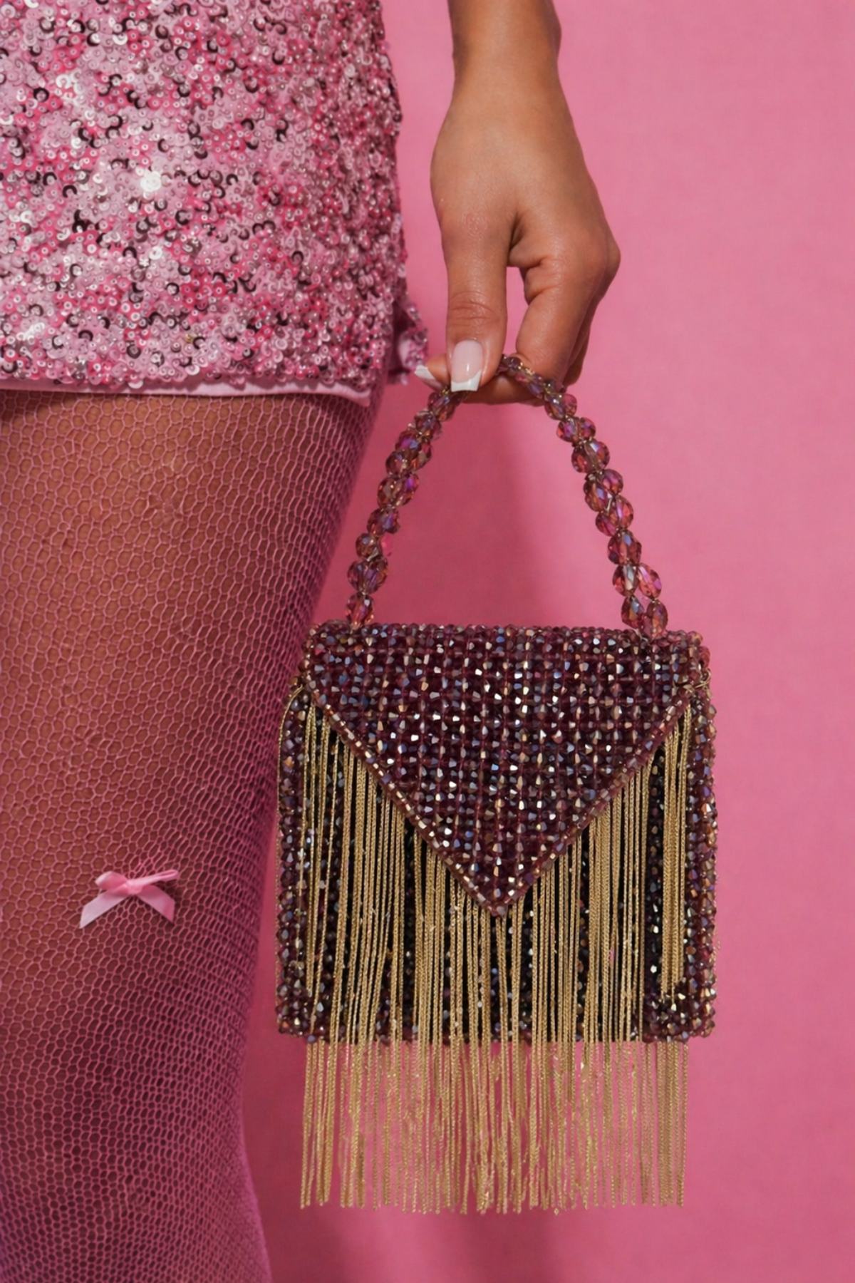 Sparkly shoulder purse inspired by glamorous vacations and luxury night-out looks