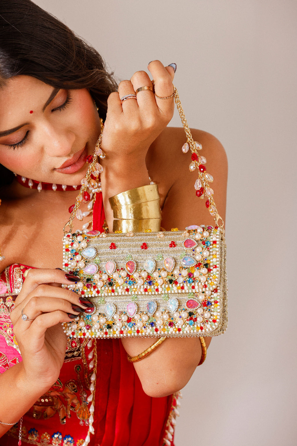 Rainbow embellished evening purse inspired by cocktail celebrations and luxury party styling