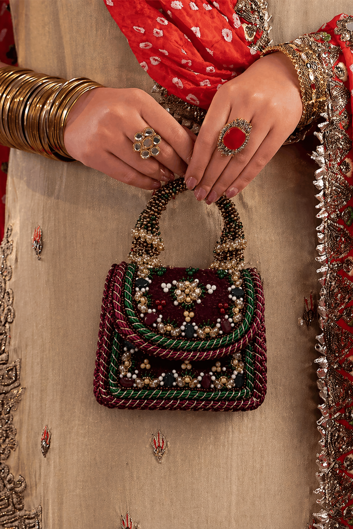 Red bridal occasion handbag designed beautifully for receptions and festive dressing