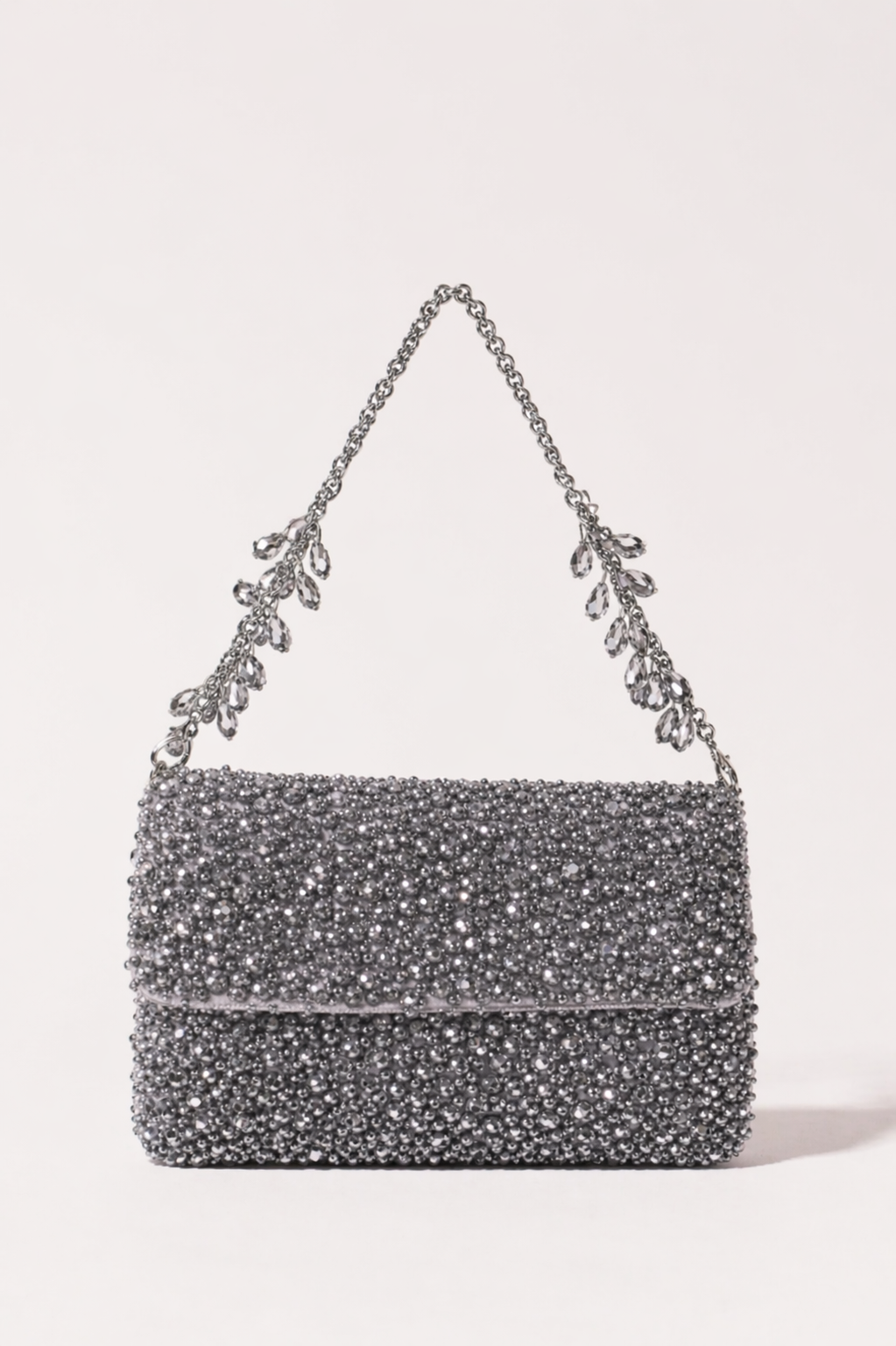 Silver crystal handbag with shimmering embellishments and delicate chain detailing