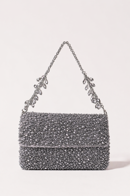 Silver crystal handbag with shimmering embellishments and delicate chain detailing