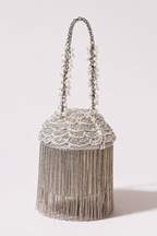 Silver embellished bucket bag with cascading fringe detailing and crystal accents