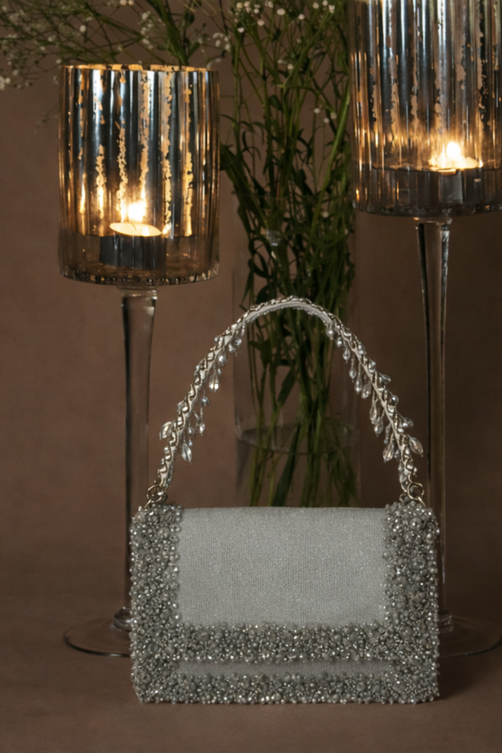 Silver evening party handbag inspired by glamorous celebrations and cocktail styling
