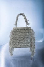 Silver festive cocktail bag with shimmering embellishments and modern evening glamour