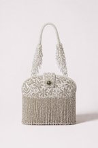 Silver fringe clutch bag with crystal embellishments and statement detailing