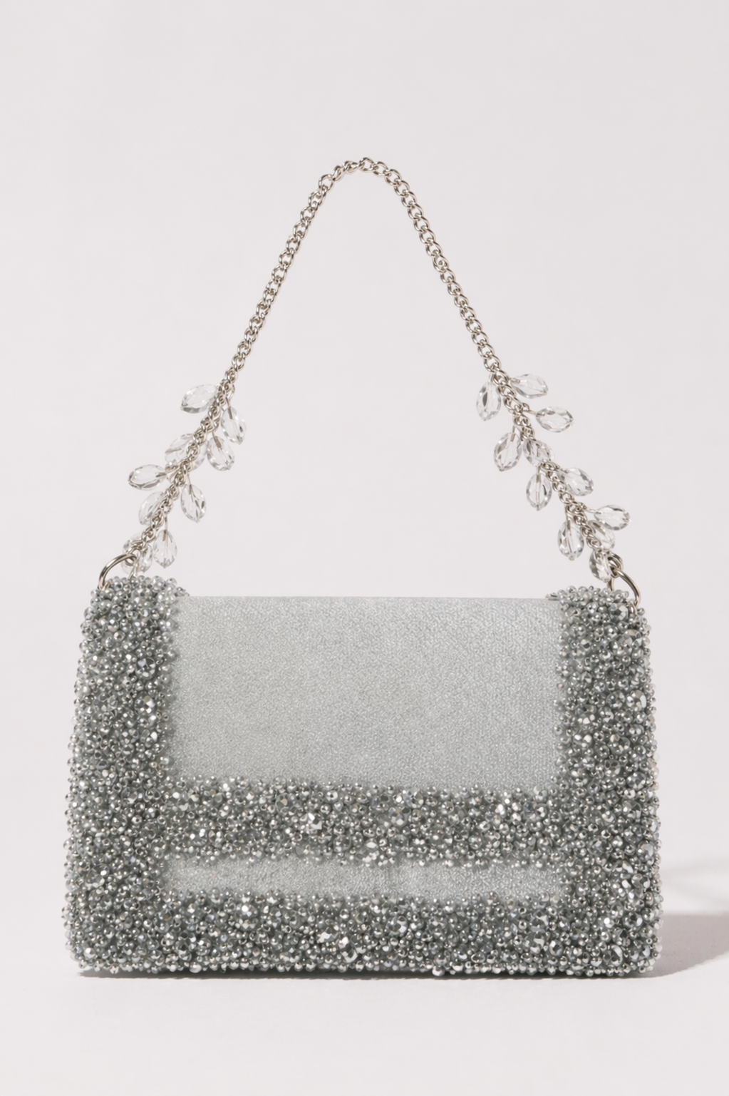 Silver crystal shoulder bag with shimmering embellishments and elegant chain detailing