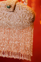 Festive silver handbag inspired by glamorous evening and celebration dressing