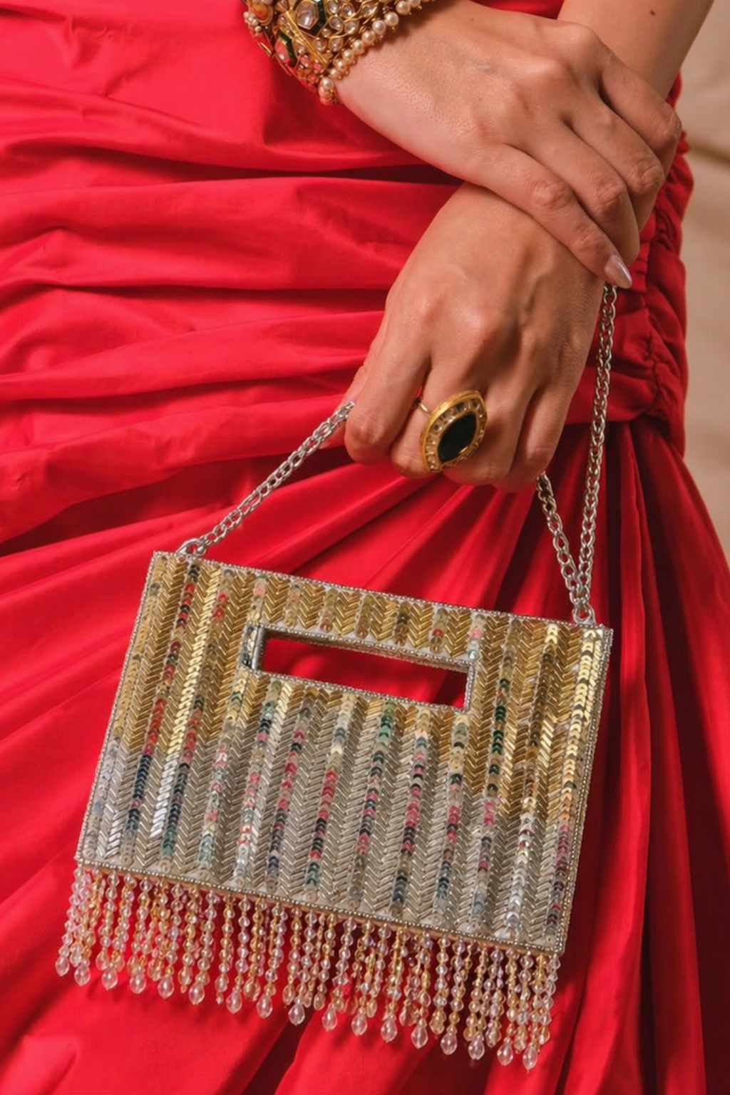 Wedding guest gold clutch styled perfectly for festive and occasion wear looks