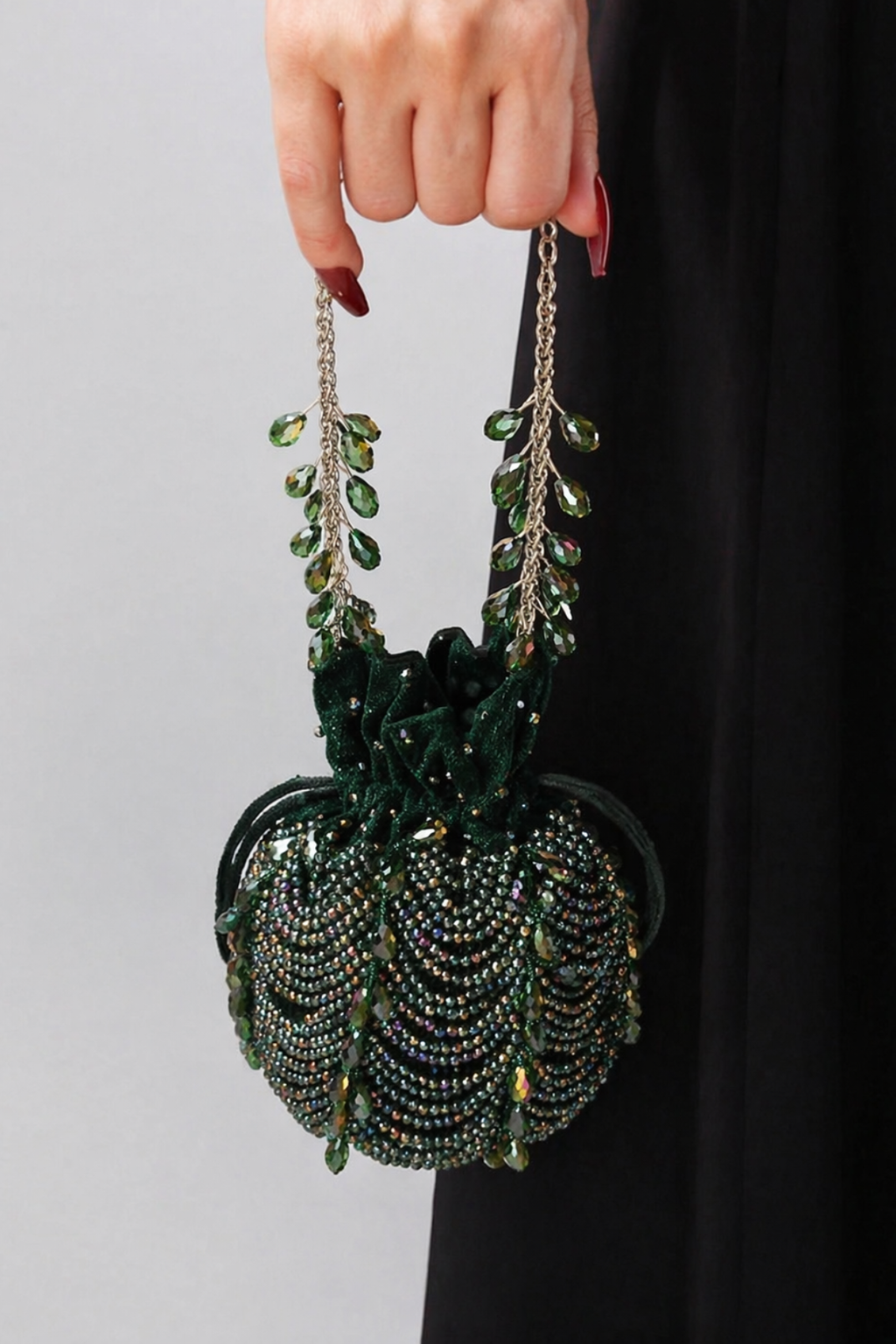 Luxury wedding guest purse featuring handcrafted beadwork and statement tassel accents