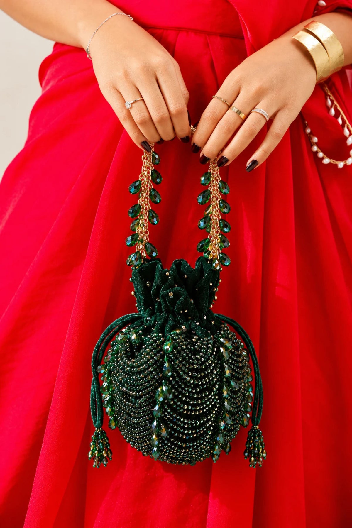 Luxury wedding guest purse featuring handcrafted beadwork and statement tassel accents