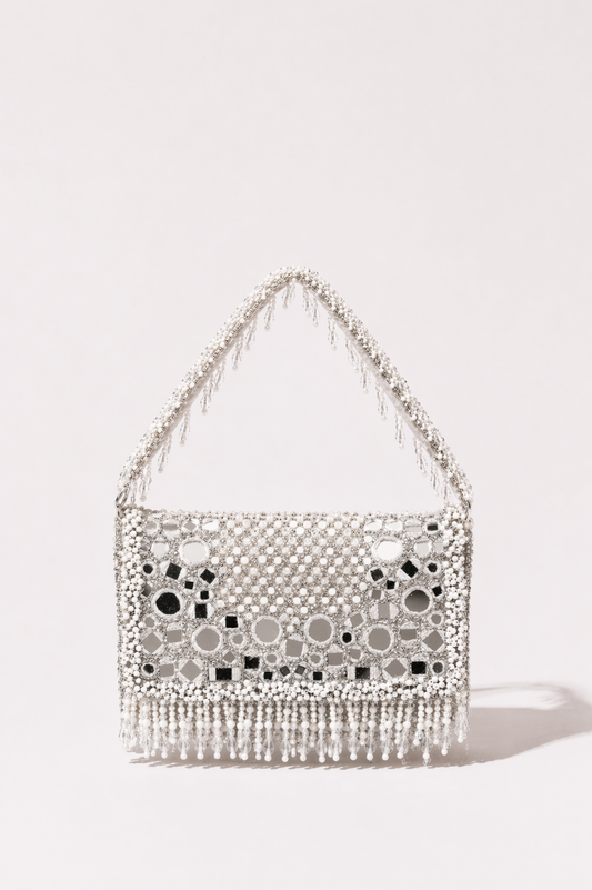 White beaded bag with pearl detailing and elegant fringe embellishments