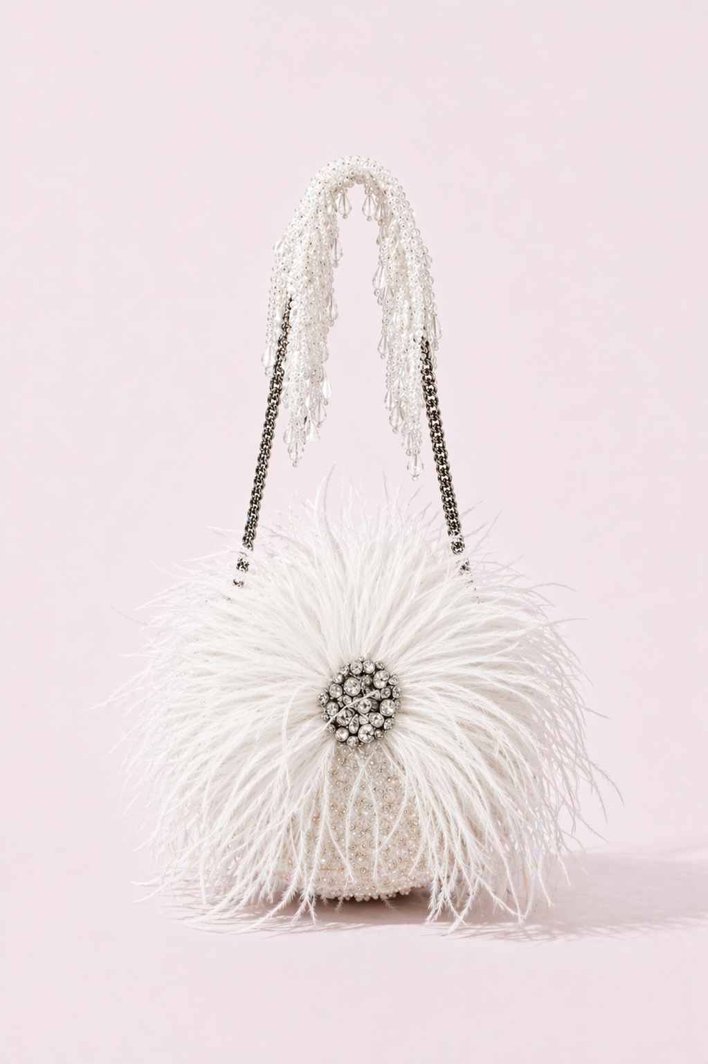 White feather mini bag with soft texture and sparkling crystal embellishments