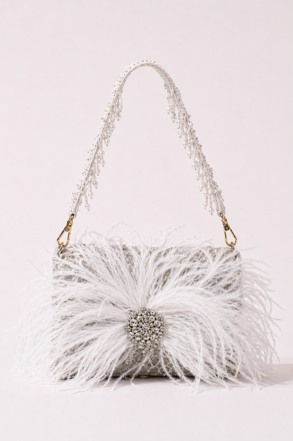 White feather handbag with crystal embellishments and dramatic couture-inspired texture